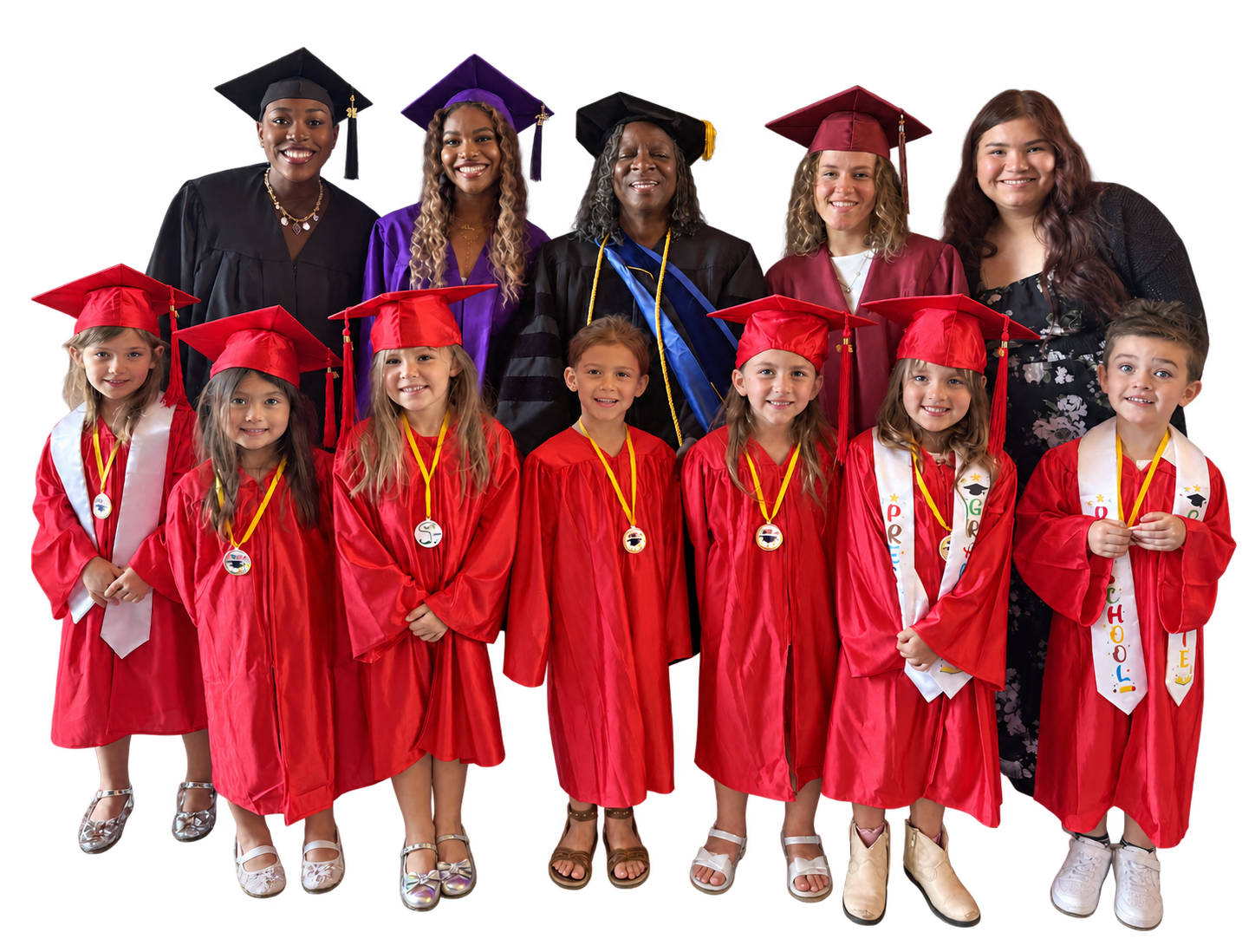 Children in red graduation gowns celebrating with the adults from their school